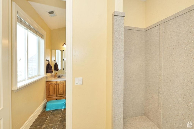 943 N Terrace Dr, Provo, UT 84604 - bathroom with visible vents, baseboards, and vanity