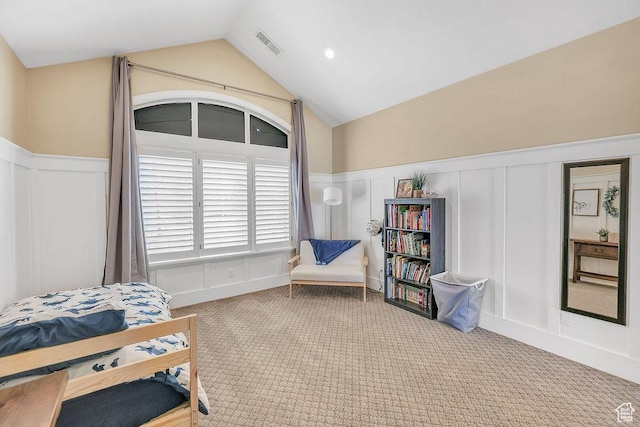 943 N Terrace Dr, Provo, UT 84604 - interior space featuring a wainscoted wall, visible vents, vaulted ceiling, and a decorative wall