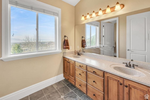 943 N Terrace Dr, Provo, UT 84604 - full bath featuring double vanity, baseboards, and a sink