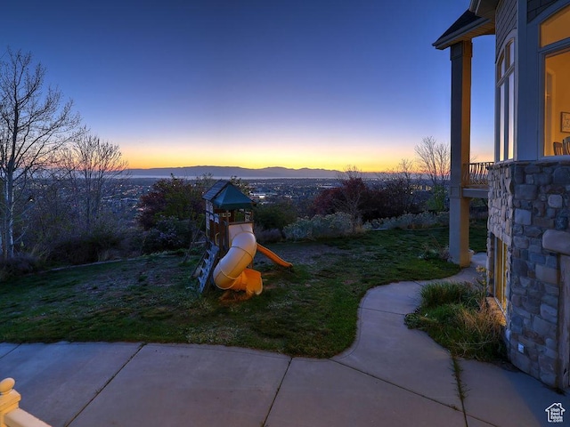 943 N Terrace Dr, Provo, UT 84604 - view of playground featuring a lawn and a patio