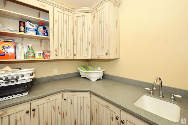 943 N Terrace Dr, Provo, UT 84604 - kitchen featuring cream cabinetry, open shelves, and a sink