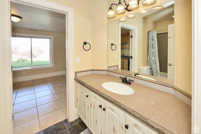 943 N Terrace Dr, Provo, UT 84604 - full bath featuring toilet, visible vents, tile patterned flooring, curtained shower, and vanity