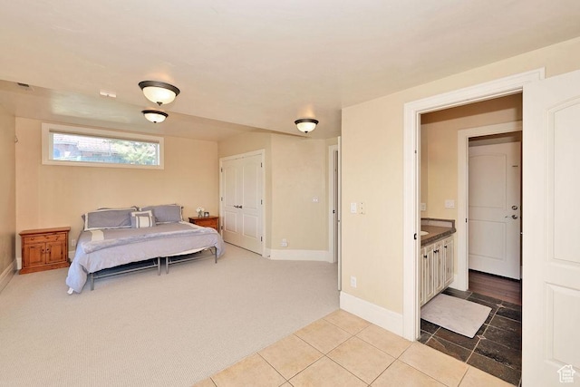 943 N Terrace Dr, Provo, UT 84604 - tiled bedroom featuring baseboards, carpet flooring, and a closet