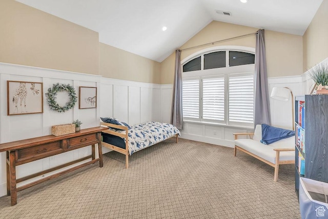 943 N Terrace Dr, Provo, UT 84604 - bedroom with lofted ceiling, carpet, visible vents, a decorative wall, and wainscoting