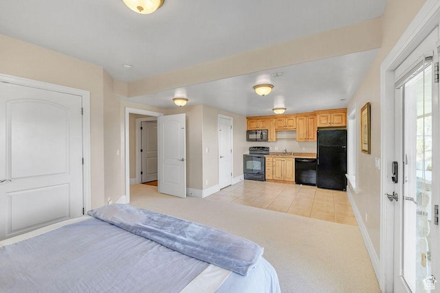 943 N Terrace Dr, Provo, UT 84604 - bedroom with baseboards, light carpet, a sink, and freestanding refrigerator