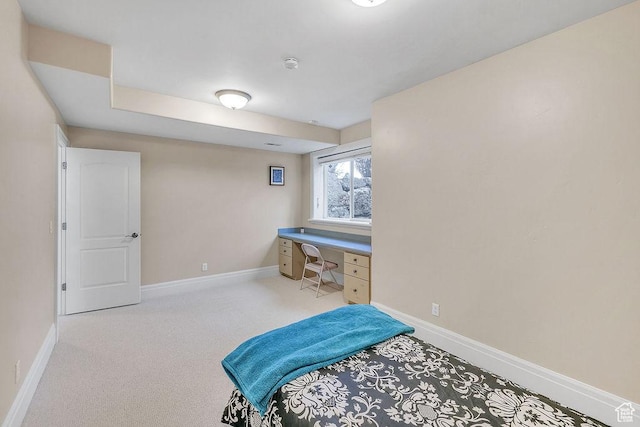 943 N Terrace Dr, Provo, UT 84604 - bedroom featuring baseboards, built in desk, and carpet flooring