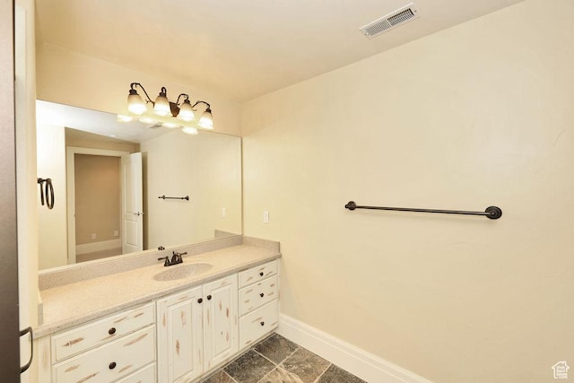 943 N Terrace Dr, Provo, UT 84604 - bathroom featuring tile patterned flooring, baseboards, vanity, and visible vents