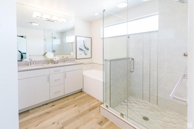 178 W Autumn Ln Unit 136, Saratoga Springs, UT 84045 - bathroom with a sink, a shower stall, and wood finished floors
