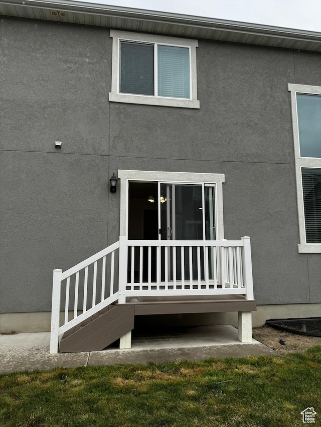 exterior space with stucco siding