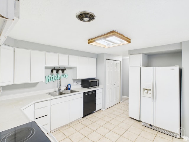 1534 N 300 W, Sunset, UT 84015 - kitchen featuring light countertops, a sink, stainless steel microwave, black dishwasher, and white refrigerator with ice dispenser