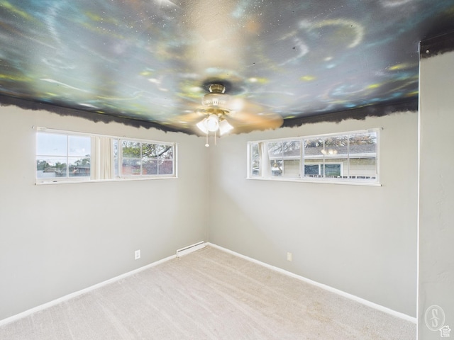 1534 N 300 W, Sunset, UT 84015 - interior space with baseboards, baseboard heating, carpet flooring, and ceiling fan