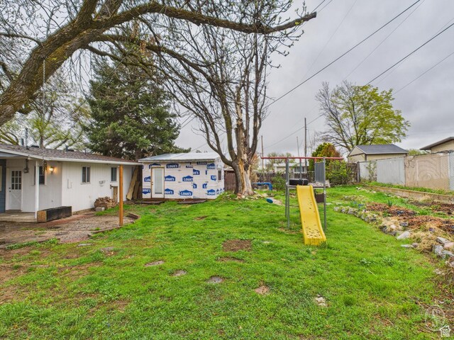 1534 N 300 W, Sunset, UT 84015 - view of yard featuring fence and a playground