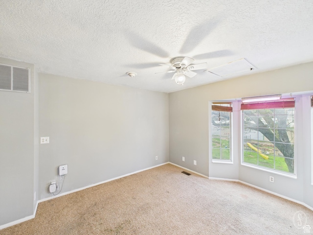 1534 N 300 W, Sunset, UT 84015 - carpeted empty room featuring baseboards, a ceiling fan, visible vents, and a textured ceiling
