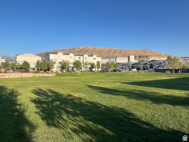 14714 S Rising Star Way, Bluffdale, UT 84065 - surrounding community with a residential view, a mountain view, and a yard