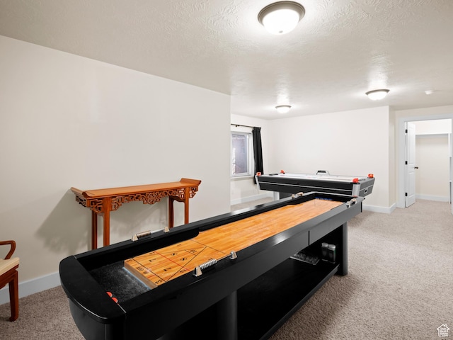 playroom with light carpet and baseboards