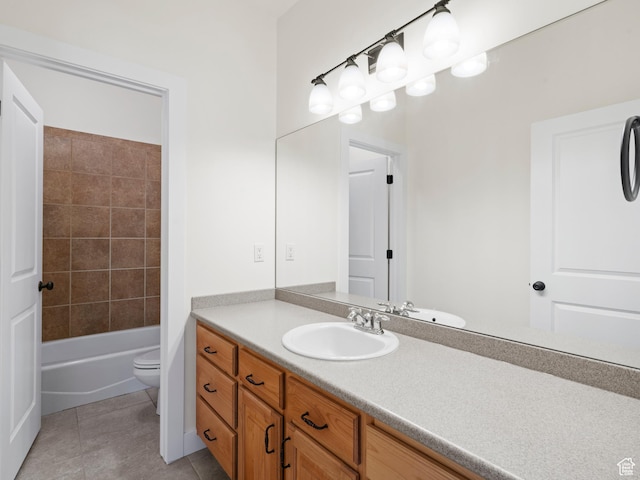 full bath with vanity, toilet, and tile patterned flooring