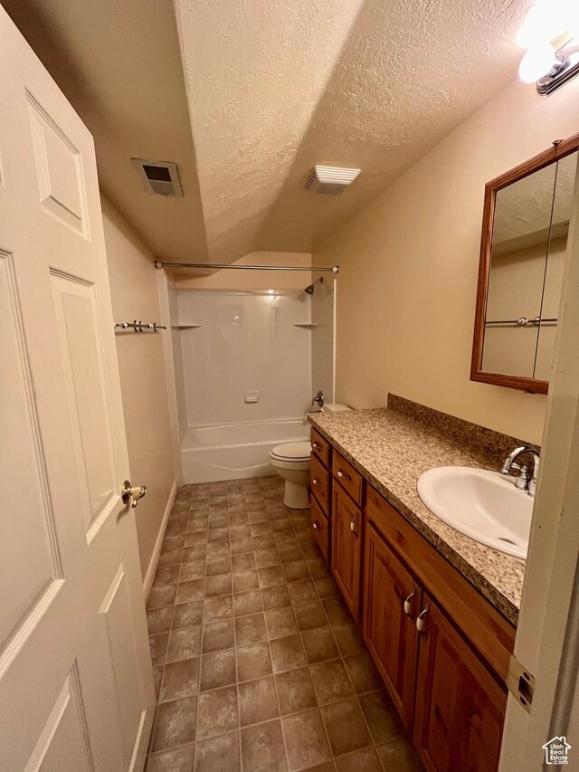 407 W Larkspur Ln, Morgan, UT 84050 - full bathroom with a textured ceiling, vanity, tub / shower combination, toilet, and visible vents