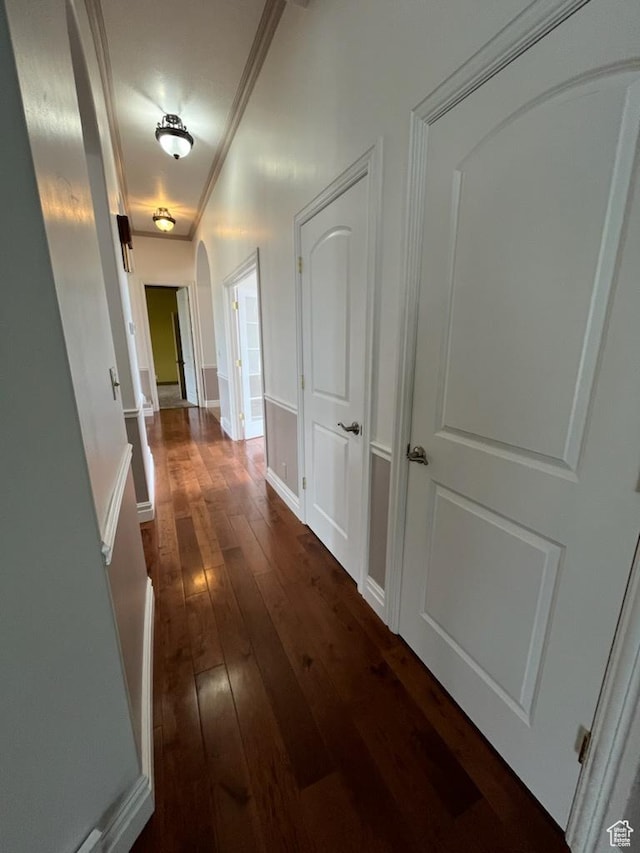 407 W Larkspur Ln, Morgan, UT 84050 - corridor featuring arched walkways, crown molding, and dark wood-type flooring