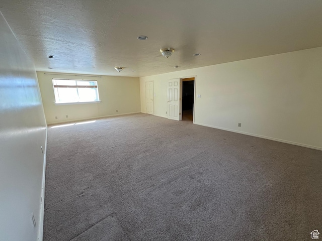 407 W Larkspur Ln, Morgan, UT 84050 - carpeted spare room featuring baseboards