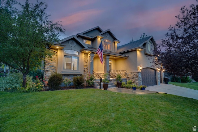 1984 N Cherry Ln, Heber City, UT 84032 - craftsman-style house with a front lawn, driveway, stone siding, an attached garage, and stucco siding