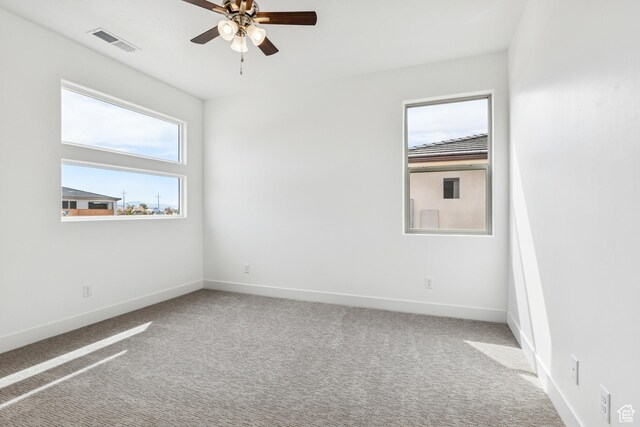 3618 W 185 N, Hurricane, UT 84737 - unfurnished room with baseboards, a ceiling fan, visible vents, and carpet