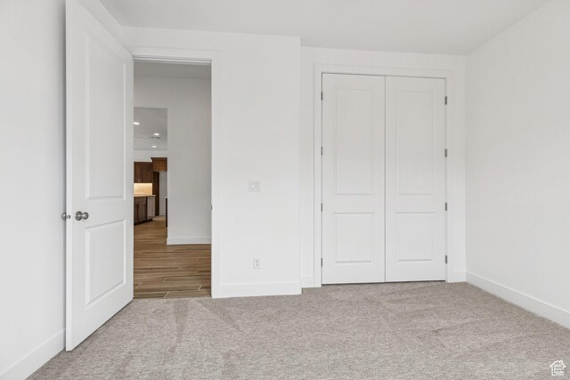 3618 W 185 N, Hurricane, UT 84737 - unfurnished bedroom featuring recessed lighting, carpet floors, a closet, and baseboards