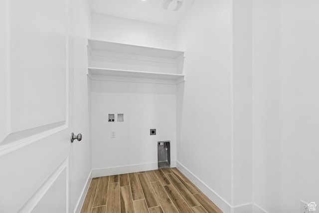 3618 W 185 N, Hurricane, UT 84737 - washroom featuring laundry area, hookup for an electric dryer, baseboards, washer hookup, and wood finish floors