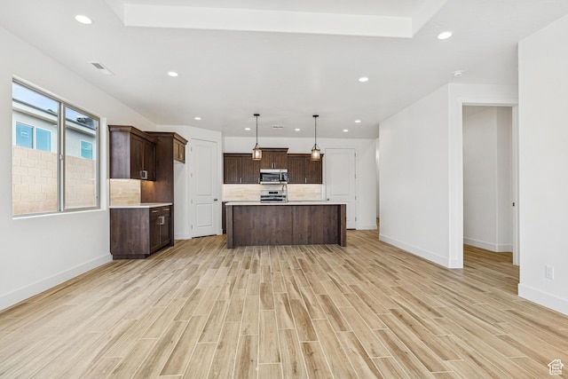 3618 W 185 N, Hurricane, UT 84737 - kitchen featuring baseboards, appliances with stainless steel finishes, light countertops, and recessed lighting