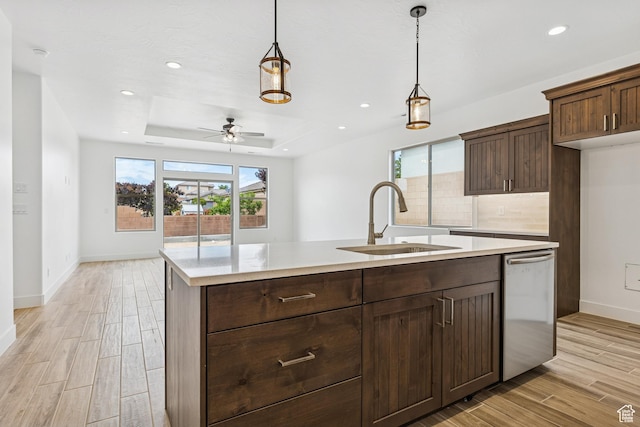 3618 W 185 N, Hurricane, UT 84737 - kitchen with dishwasher, light wood-style floors, a sink, and light countertops