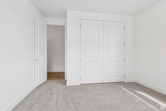 3618 W 185 N, Hurricane, UT 84737 - unfurnished bedroom featuring carpet floors, a closet, and baseboards