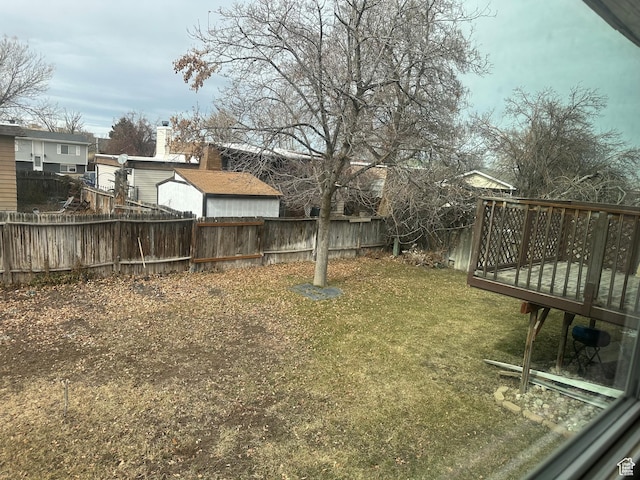 4584 S Knightsbridge Rd, Taylorsville, UT 84129 - view of yard featuring a fenced backyard and a deck