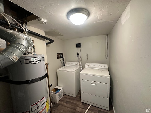 4584 S Knightsbridge Rd, Taylorsville, UT 84129 - clothes washing area with water heater, washing machine and dryer, wood finished floors, and laundry area