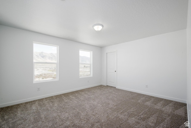 1784 E Bison Dr Unit B234, Eagle Mountain, UT 84005 - empty room with baseboards and carpet
