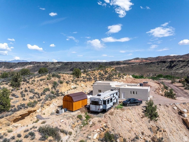 126 W Bowler Rd, Gunlock, UT 84733 - birds eye view of property with a desert view and a mountain view
