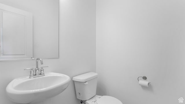 794 Brook Ave E, Tooele, UT 84074 - half bath featuring toilet and a sink
