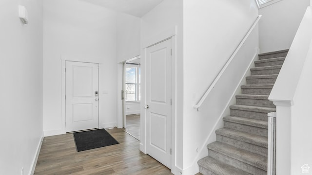 794 Brook Ave E, Tooele, UT 84074 - entrance foyer with baseboards, stairs, and light wood-type flooring