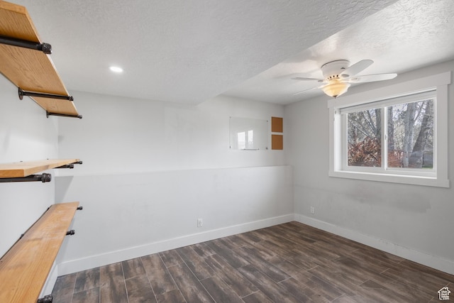 spare room featuring baseboards, a ceiling fan, wood finished floors, and recessed lighting