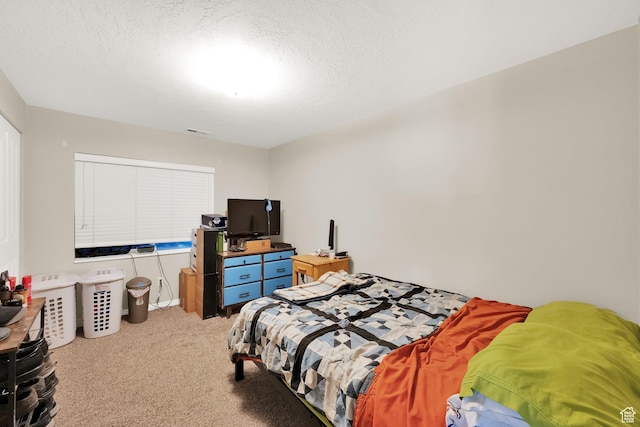 carpeted bedroom with visible vents