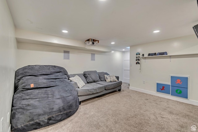 living room with recessed lighting, carpet floors, and baseboards