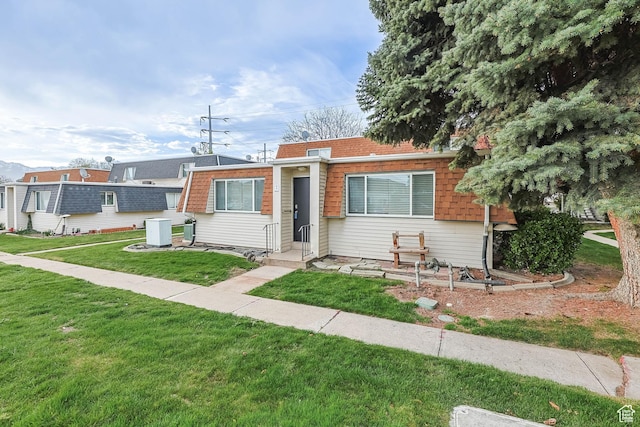 1210 W 4365 S Unit 3A, Taylorsville, UT 84123 - view of front of property featuring a front lawn and cooling unit