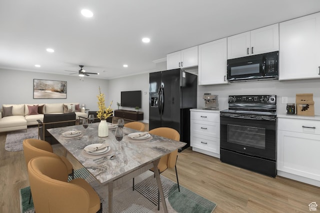 1210 W 4365 S Unit 3A, Taylorsville, UT 84123 - kitchen with a ceiling fan, light wood-style flooring, black appliances, light countertops, and white cabinets