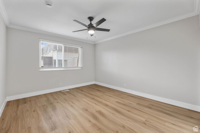 1210 W 4365 S Unit 3A, Taylorsville, UT 84123 - empty room with crown molding, baseboards, and wood finished floors