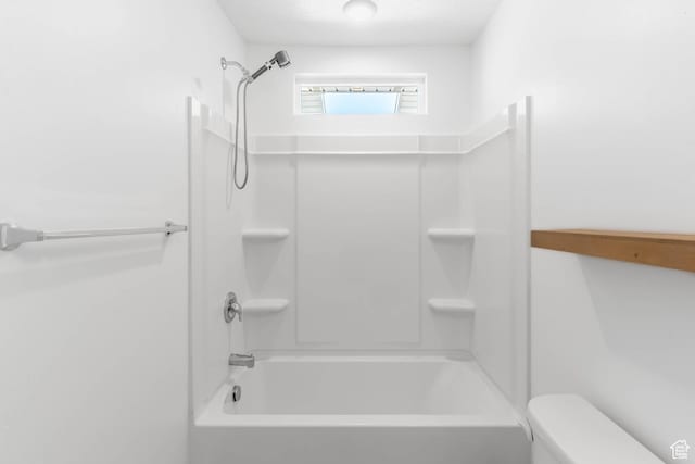 full bath featuring  shower combination and toilet