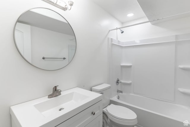 full bath with bathing tub / shower combination, vanity, and toilet