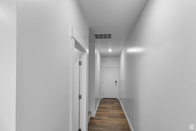 627 W 575 N Unit 545, Smithfield, UT 84335 - hallway featuring wood finished floors, visible vents, and baseboards