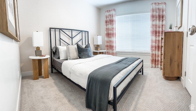 627 W 575 N Unit 545, Smithfield, UT 84335 - bedroom with baseboards and light colored carpet