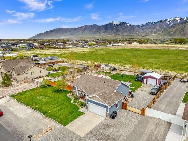 4104 Rose Springs Rd Unit 406, Erda, UT 84074 - drone / aerial view with a residential view and a mountain view