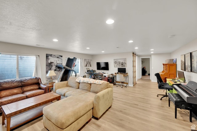4104 Rose Springs Rd Unit 406, Erda, UT 84074 - living area with baseboards, recessed lighting, and light wood-type flooring