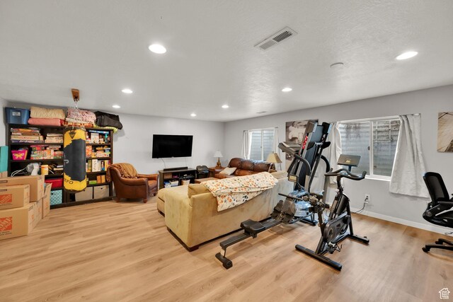 4104 Rose Springs Rd Unit 406, Erda, UT 84074 - interior space featuring wood finished floors, visible vents, and recessed lighting