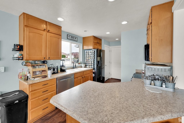 4104 Rose Springs Rd Unit 406, Erda, UT 84074 - kitchen with a peninsula, stainless steel dishwasher, refrigerator with ice dispenser, and light countertops